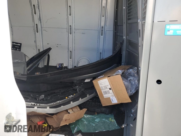 2023 Chevrolet Express Cargo z VIN 1GCWGAFP5P1180905, wystawiony jako Copart lot #87729115 z przebiegiem Nie podano mil oraz Nie do naprawy • Non repairable. Historia ofert i sprzedaży dostępna na DreamBid. Obrazek 11.