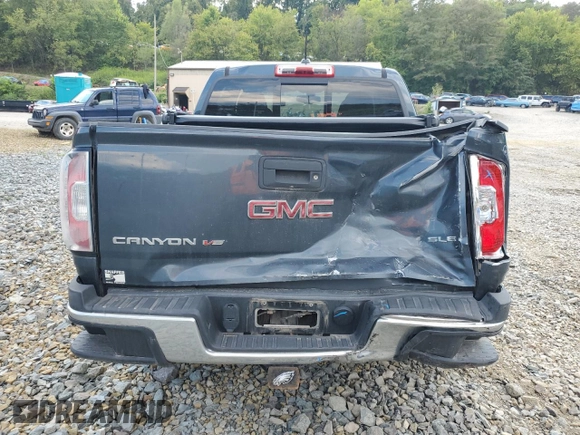 2020 GMC Canyon 4WD SLE with VIN 1GTG6CEN2L1158812, listed as a Copart auction lot 69625544 with 92,479 mi miles and Salvage Title. Bid and sale history available at carsss.com. Image 6.