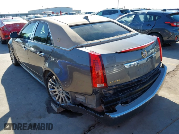 2012 Cadillac CTS Luxury z VIN 1G6DF5E58C0142041, wystawiony jako IAAI lot #42235864 z przebiegiem 59 697 mil mil oraz . Historia ofert i sprzedaży dostępna na DreamBid. Obrazek 3.