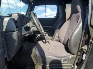 2002 Jeep Wrangler X with VIN 1J4FA39S12P732459, listed as a Copart auction lot 68877244 with 167,368 mi miles and Salvage Title. Bid and sale history available at carsss.com. Image 7.