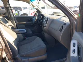 2003 Ford Escape XLT Popular 2 with VIN 1FMCU93143KB10936, listed as a IAAI auction lot 41414430 with 170,050 mi miles. Bid and sale history available at carsss.com. Image 5.