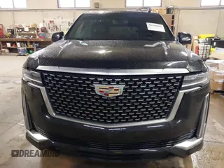 2021 Cadillac Escalade Luxury z VIN 1GYS4AKL7MR295510, wystawiony jako IAAI lot #38398966 z przebiegiem 26 228 mil mil oraz . Historia ofert i sprzedaży dostępna na DreamBid. Obrazek 12.