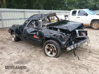 2003 GMC Sonoma with VIN 1GTCS19H038270227, listed as a Copart auction lot 61437014 with Not Provided miles and Non Repairable. Bid and sale history available at DreamBid. Image 4.