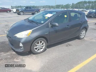 2012 Toyota Prius One z VIN JTDKDTB3XC1020910, wystawiony jako IAAI lot #42416977 z przebiegiem 238 822 mil mil oraz . Historia ofert i sprzedaży dostępna na DreamBid. Obrazek 2.