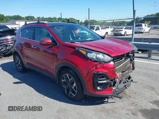 2020 Kia Sportage EX with VIN KNDPN3AC7L7695034, listed as a IAAI auction lot 42330980 with 97,542 mi miles and . Bid and sale history available at DreamBid. Image 1.