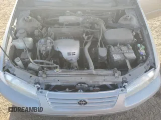 1998 Toyota Camry LE z VIN JT2BG28K2W0164356, wystawiony jako Copart lot #49450065 z przebiegiem 240 905 mil mil oraz Czysty tytuł • Clean title. Historia ofert i sprzedaży dostępna na DreamBid. Obrazek 11.