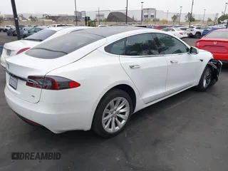2017 Tesla Model S 60 with VIN 5YJSA1E19HF189578, listed as a IAAI auction lot 42374977 with 40,844 mi miles and . Bid and sale history available at DreamBid. Image 4.