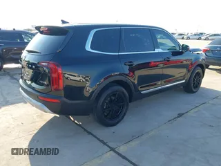 2021 Kia Telluride LX with VIN 5XYP24HC3MG152384, listed as a IAAI auction lot 41520433 with 76,032 mi miles and . Bid and sale history available at DreamBid. Image 4.