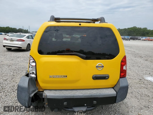 2005 Nissan Xterra SE z VIN 5N1AN08WX5C620712, wystawiony jako Copart lot #57815735 z przebiegiem 203 340 mil mil oraz Szkoda całkowita • Salvage title. Historia ofert i sprzedaży dostępna na DreamBid. Obrazek 6.