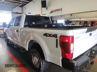 2021 Ford F-250 XL z VIN 1FT7W2B61MEC82586, wystawiony jako IAAI lot #42360417 z przebiegiem 125 390 mil mil oraz . Historia ofert i sprzedaży dostępna na DreamBid. Obrazek 1.