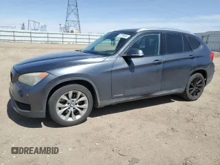 2014 BMW X1 xDrive28i with VIN WBAVL1C51EVY20752, listed as a Copart auction lot 52236685 with 130,956 mi miles and Clean Title. Bid and sale history available at carsss.com. Image 1.
