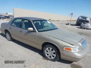 1999 Ford Crown Victoria z VIN 2FAFP73W7XX179492, wystawiony jako IAAI lot #42188954 z przebiegiem 137 299 mil mil oraz . Historia ofert i sprzedaży dostępna na DreamBid. Obrazek 1.