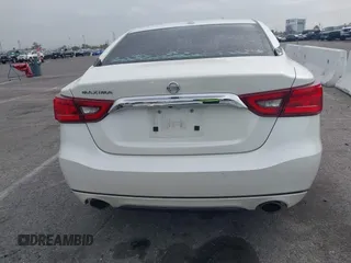 2016 Nissan Maxima SL with VIN 1N4AA6AP3GC448957, listed as a IAAI auction lot 41734717 with 128,687 mi miles and . Bid and sale history available at DreamBid. Image 16.