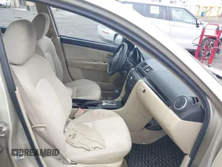 2006 Mazda 3 i Touring with VIN JM1BK12F961462392, listed as a IAAI auction lot 41322168 with 127,511 mi miles and . Bid and sale history available at DreamBid. Image 5.