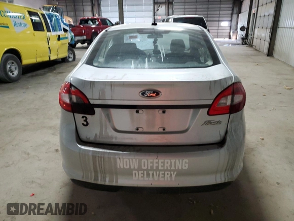2012 Ford Fiesta S с VIN 3FADP4AJ4CM153631, выставлен на аукционе Copart как лот 49385815 с пробегом Не указан миль и Списание • Salvage title. История ставок и продаж доступна на DreamBid. Изображение 6.