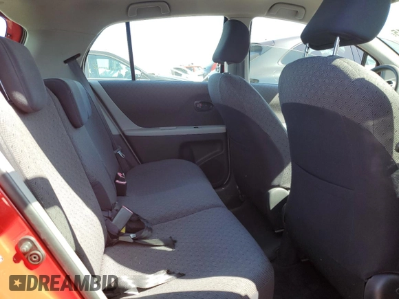 2009 Toyota Yaris with VIN JTDKT903095246576, listed as a Copart auction lot 52150915 with 90,276 mi miles and Salvage Title. Bid and sale history available at DreamBid. Image 10.