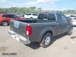 2005 Nissan Frontier 2WD Nismo with VIN 1N6AD06U75C414950, listed as a IAAI auction lot 42049729 with 293,285 mi miles. Bid and sale history available at carsss.com. Image 4.