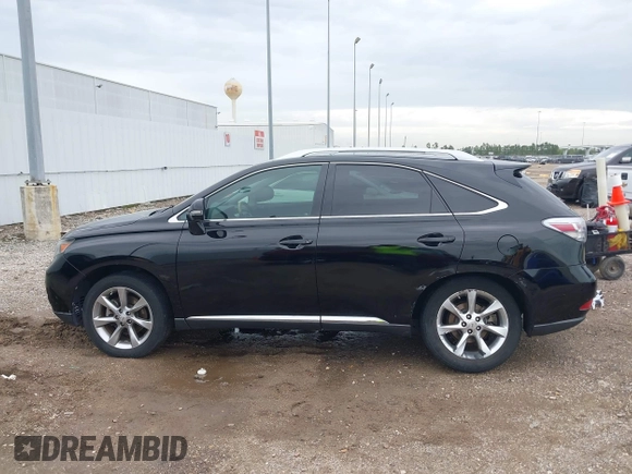 2012 Lexus RX with VIN 2T2ZK1BA1CC079357, listed as a IAAI auction lot 41878751 with 153,466 mi miles and . Bid and sale history available at carsss.com. Image 14.