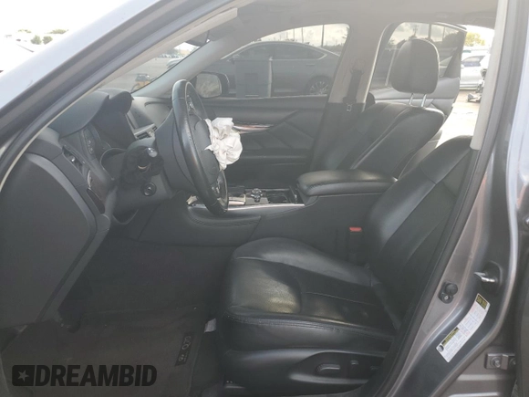 2015 Infiniti Q70 z VIN JN1BY1AP1FM541792, wystawiony jako Copart lot #86699094 z przebiegiem Nie podano mil oraz Szkoda całkowita • Salvage title. Historia ofert i sprzedaży dostępna na DreamBid. Obrazek 7.