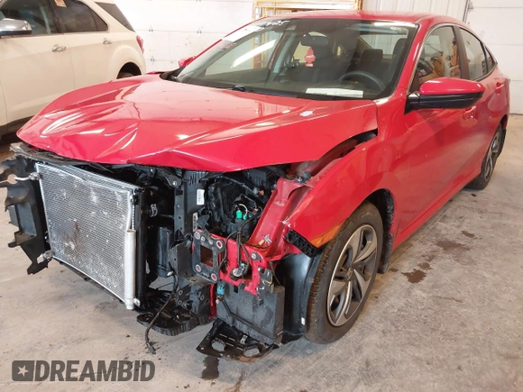 2020 Honda Civic LX with VIN 2HGFC2F63LH507310, listed as a IAAI auction lot 42180914 with 54,599 mi miles and . Bid and sale history available at DreamBid. Image 12.