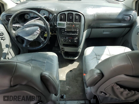 2005 Dodge Caravan SXT with VIN 2D4GP44L95R424704, listed as a Copart auction lot 61243925 with 190,608 mi miles and Salvage title. Bid and sale history available at DreamBid. Image 8.
