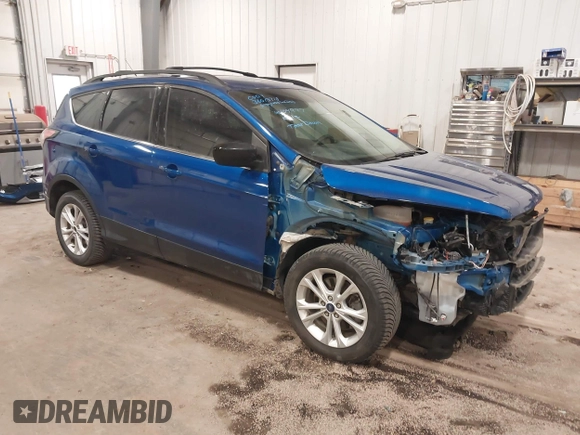 2017 Ford Escape SE z VIN 1FMCU0G90HUA94581, wystawiony jako IAAI lot #41396965 z przebiegiem 104 978 mil mil oraz . Historia ofert i sprzedaży dostępna na DreamBid. Obrazek 1.