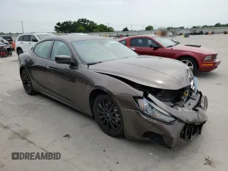 2014 Maserati Ghibli S Q4 with VIN ZAM57RTA6E1085708, listed as a Copart auction lot 53710095 with 110,799 mi miles and Salvage title. Bid and sale history available at DreamBid. Image 4.