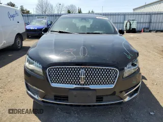 2017 Lincoln MKZ Reserve z VIN 3LN6L5F91HR601851, wystawiony jako Copart lot #54720405 z przebiegiem Nie podano mil oraz Czysty tytuł • Clean title. Historia ofert i sprzedaży dostępna na DreamBid. Obrazek 5.
