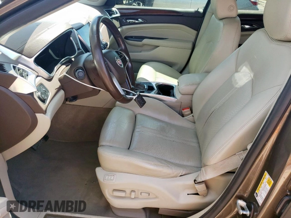 2014 Cadillac SRX Premium Collection with VIN 3GYFNDE33ES567108, listed as a Copart auction lot 55970265 with 97,720 mi miles and Salvage title. Bid and sale history available at DreamBid. Image 7.