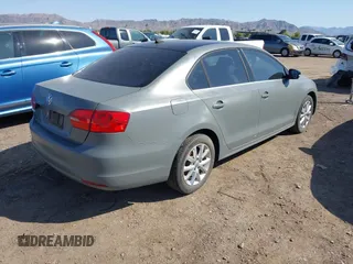 2014 Volkswagen Jetta SE с VIN 3VWD17AJ3EM420318, выставлен на аукционе IAAI как лот 42454507 с пробегом 96 332 миль миль и . История ставок и продаж доступна на DreamBid. Изображение 4.
