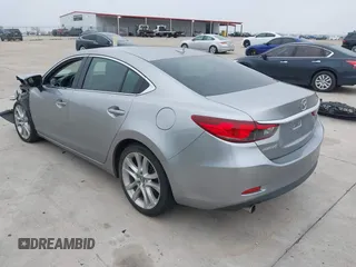 2015 Mazda 6 i Touring with VIN JM1GJ1V56F1209476, listed as a IAAI auction lot 41644215 with 112,255 mi miles. Bid and sale history available at carsss.com. Image 3.