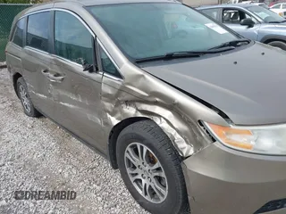 2013 Honda Odyssey EX-L with VIN 5FNRL5H65DB064238, listed as a IAAI auction lot 42050743 with 189,437 mi miles and . Bid and sale history available at carsss.com. Image 6.