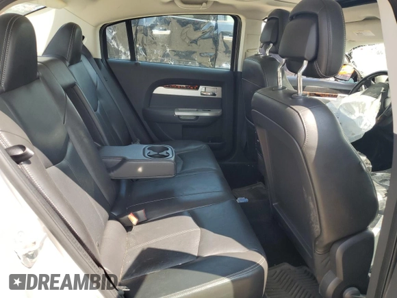2010 Chrysler Sebring Limited with VIN 1C3CC5FDXAN162044, listed as a Copart auction lot 56789075 with Not provided miles and Non repairable. Bid and sale history available at DreamBid. Image 10.