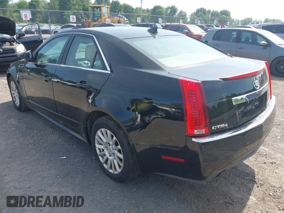 2012 Cadillac CTS Luxury z VIN 1G6DG5E58C0134874, wystawiony jako IAAI lot #42564120 z przebiegiem 121 053 mil mil oraz . Historia ofert i sprzedaży dostępna na DreamBid. Obrazek 3.