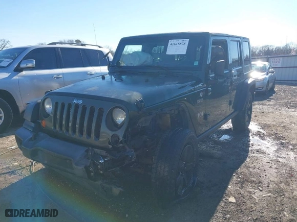 2008 Jeep Wrangler Unlimited X with VIN 1J8GA39118L594626, listed as a IAAI auction lot 41618878 with 166,071 mi miles. Bid and sale history available at carsss.com. Image 2.