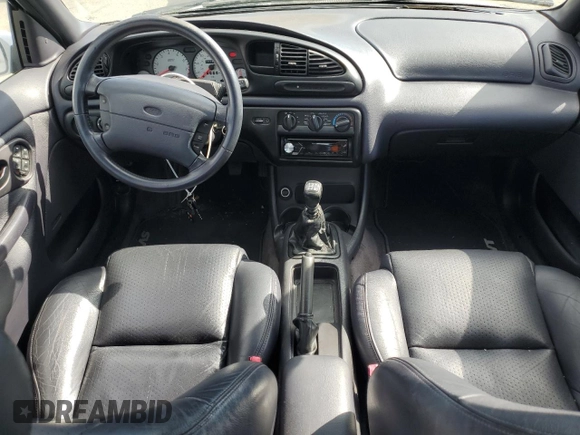 1999 Ford Contour z VIN 1FAFP68G9XK142510, wystawiony jako Copart lot #74818384 z przebiegiem 65 885 mil mil oraz Tytuł czysty. Historia ofert i sprzedaży dostępna na DreamBid. Obrazek 8.