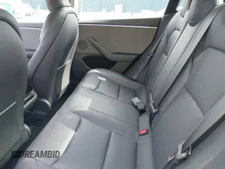 2024 Tesla Model 3 z VIN 5YJ3E1EA4RF742745, wystawiony jako IAAI lot #42085235 z przebiegiem 28 094 mil mil oraz . Historia ofert i sprzedaży dostępna na DreamBid. Obrazek 8.