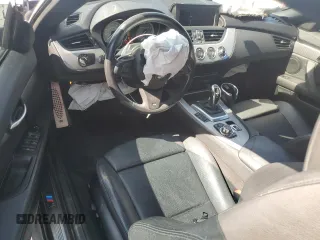 2011 BMW Z4 sDrive35is with VIN WBALM1C54BE633439, listed as a Copart auction lot 60327265 with 112,302 mi miles and Salvage title. Bid and sale history available at DreamBid. Image 8.
