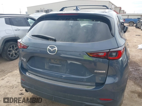 2023 Mazda CX-5 S Carbon Edition z VIN JM3KFBCM6P0288402, wystawiony jako IAAI lot #41682386 z przebiegiem 30 482 mil mil oraz . Historia ofert i sprzedaży dostępna na DreamBid. Obrazek 16.