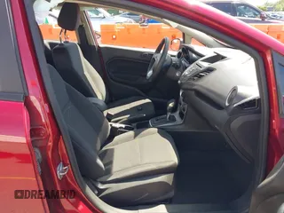 2017 Ford Fiesta SE z VIN 3FADP4EJ4HM168566, wystawiony jako IAAI lot #42223504 z przebiegiem 53 572 mil mil oraz . Historia ofert i sprzedaży dostępna na DreamBid. Obrazek 5.