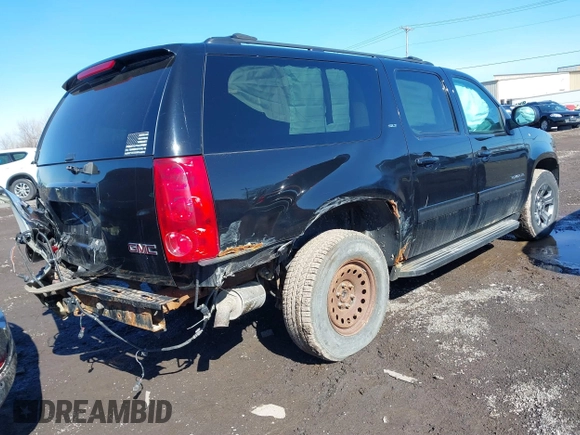 2013 GMC Yukon XL SLT with VIN 1GKS2KE71DR348271, listed as a IAAI auction lot 41388489 with 261,334 mi miles. Bid and sale history available at carsss.com. Image 4.