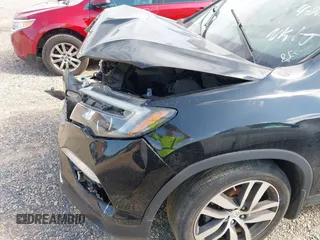 2017 Honda Pilot Touring with VIN 5FNYF5H91HB038268, listed as a IAAI auction lot 42786448 with 62,195 mi miles and . Bid and sale history available at DreamBid. Image 22.