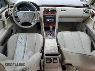 1999 Mercedes-Benz E-Class with VIN WDBJH65F9XA880146, listed as a Copart auction lot 72306164 with 192,442 mi miles and Salvage Title. Bid and sale history available at carsss.com. Image 8.
