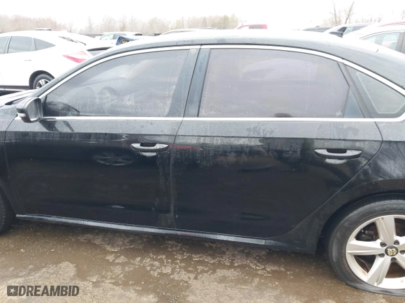 2013 Volkswagen Passat SE with VIN 1VWBP7A33DC114324, listed as a IAAI auction lot 41609521 with 110,229 mi miles. Bid and sale history available at carsss.com. Image 14.