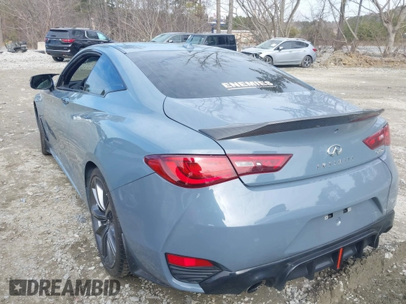2021 Infiniti Q60 Red Sport 400 with VIN JN1FV7LKXMM530401, listed as a IAAI auction lot 41409153 with 31,247 mi miles and . Bid and sale history available at DreamBid. Image 3.