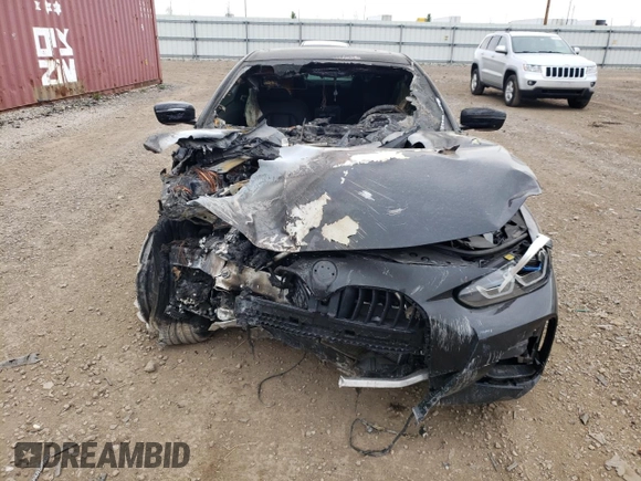 2021 BMW 4 Series M440i xDrive with VIN WBA13AR06MCF66804, listed as a Copart auction lot 50761734 with Not Provided miles and Salvage Title. Bid and sale history available at DreamBid. Image 5.