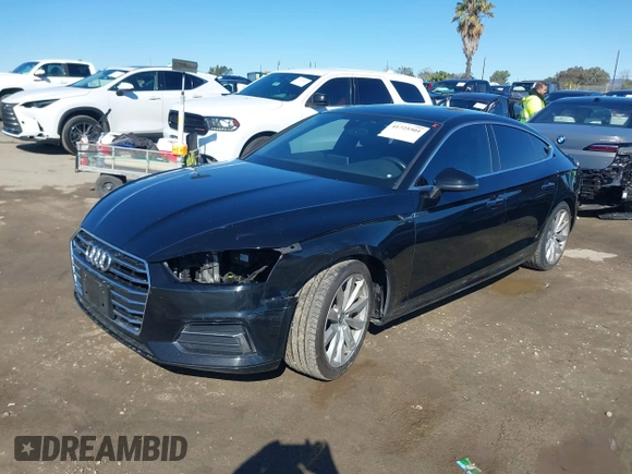 2018 Audi A5 Sportback Premium z VIN WAUANCF53JA009200, wystawiony jako IAAI lot #41725501 z przebiegiem 107 076 mil mil oraz . Historia ofert i sprzedaży dostępna na DreamBid. Obrazek 2.