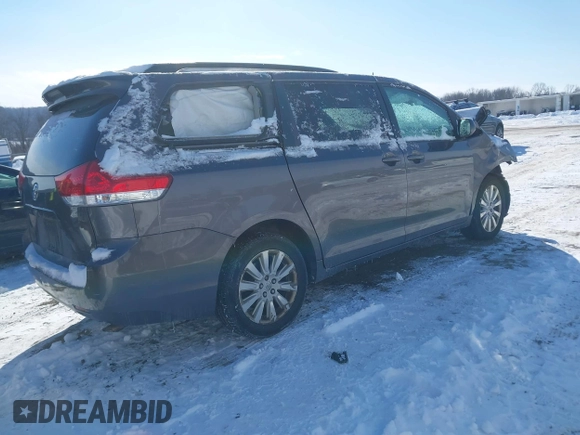 2013 Toyota Sienna LE with VIN 5TDJK3DCXDS061105, listed as a IAAI auction lot 41363922 with 163,231 mi miles and . Bid and sale history available at DreamBid. Image 4.