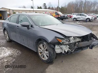 2014 Lexus ES 330 with VIN JTHBK1GG0E2113100, listed as a IAAI auction lot 41309816 with 233,535 mi miles and . Bid and sale history available at DreamBid. Image 1.