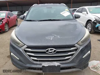 2017 Hyundai Tucson Value with VIN KM8J33A22HU358357, listed as a IAAI auction lot 41583774 with 139,338 mi miles. Bid and sale history available at carsss.com. Image 13.